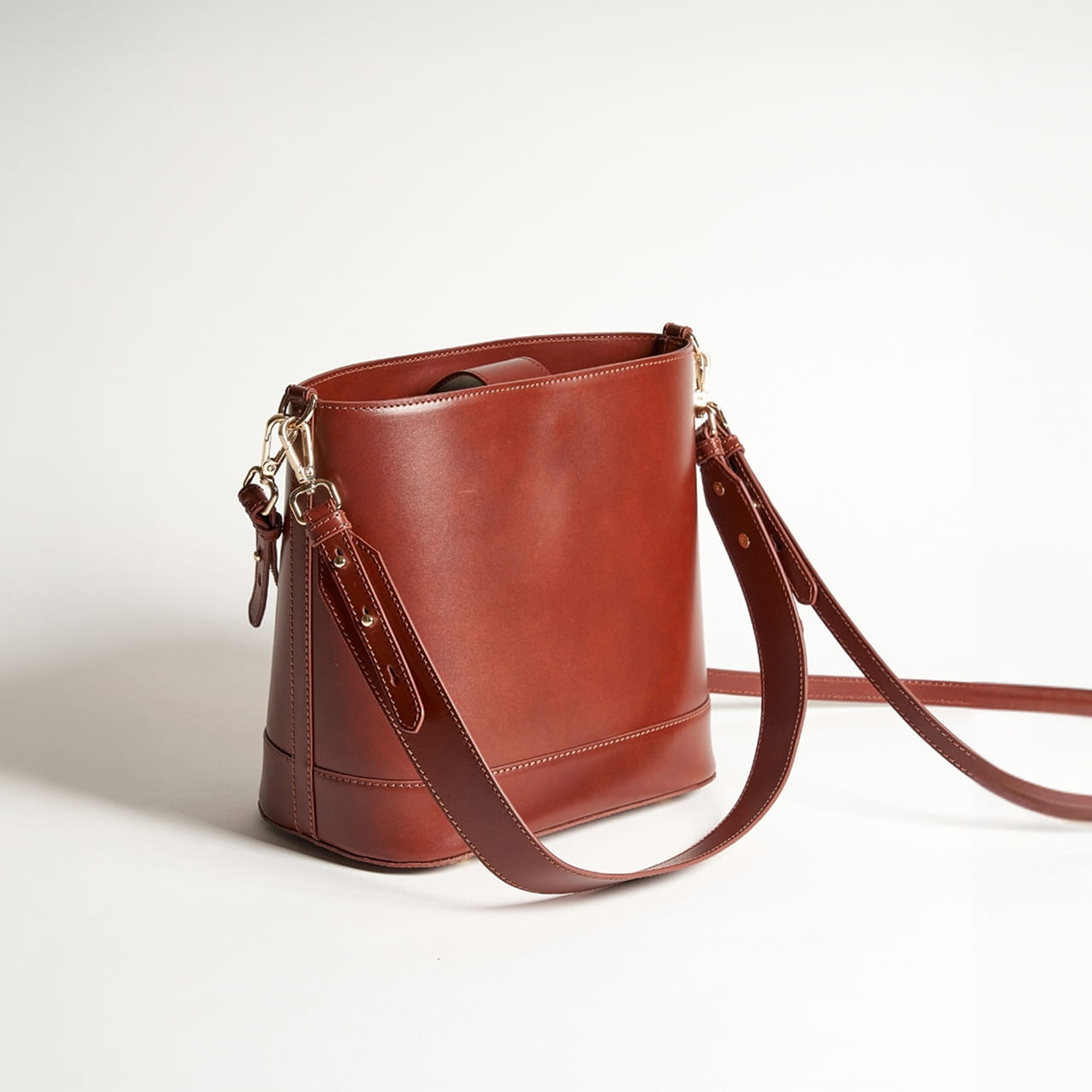 sac seau en cuir cognac pour femme