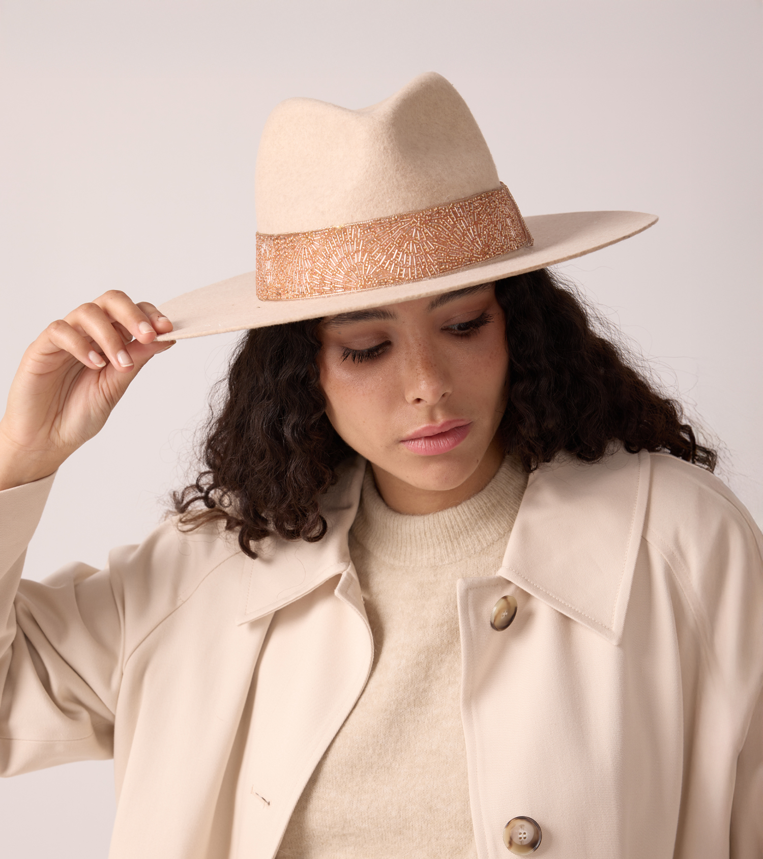 women's white and gold felt hat