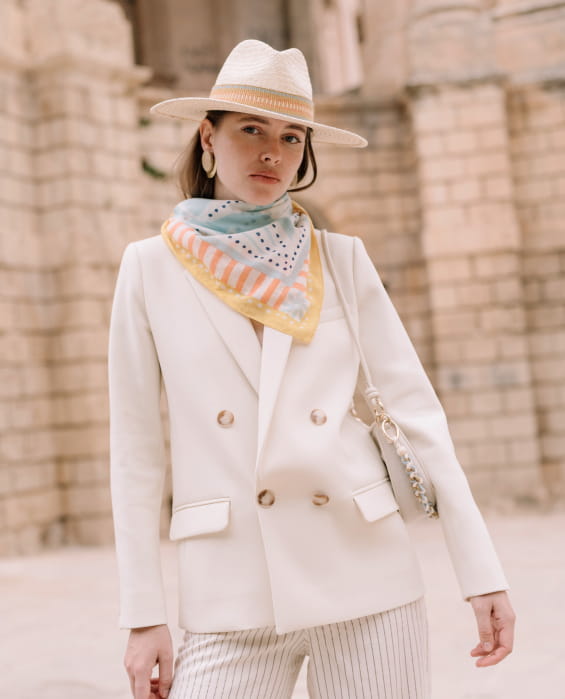woman wearing a scarf and a hat