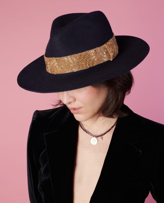 women's black felt hat with gold braid