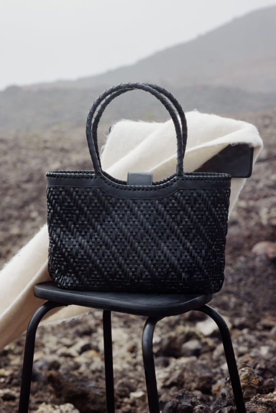 black woven leather tote bag